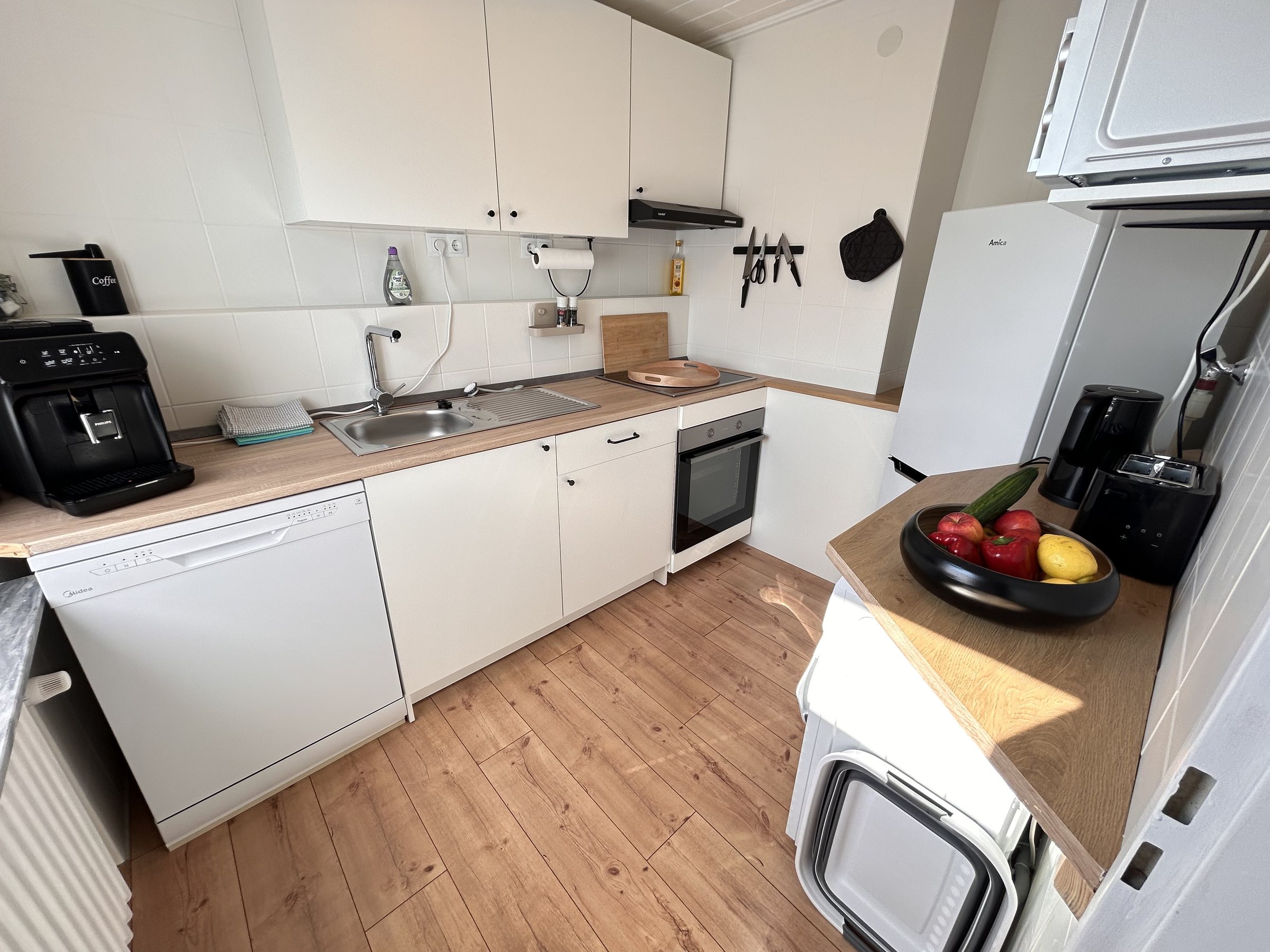 Küche und Wohnbereich in Ferienwohnung 2